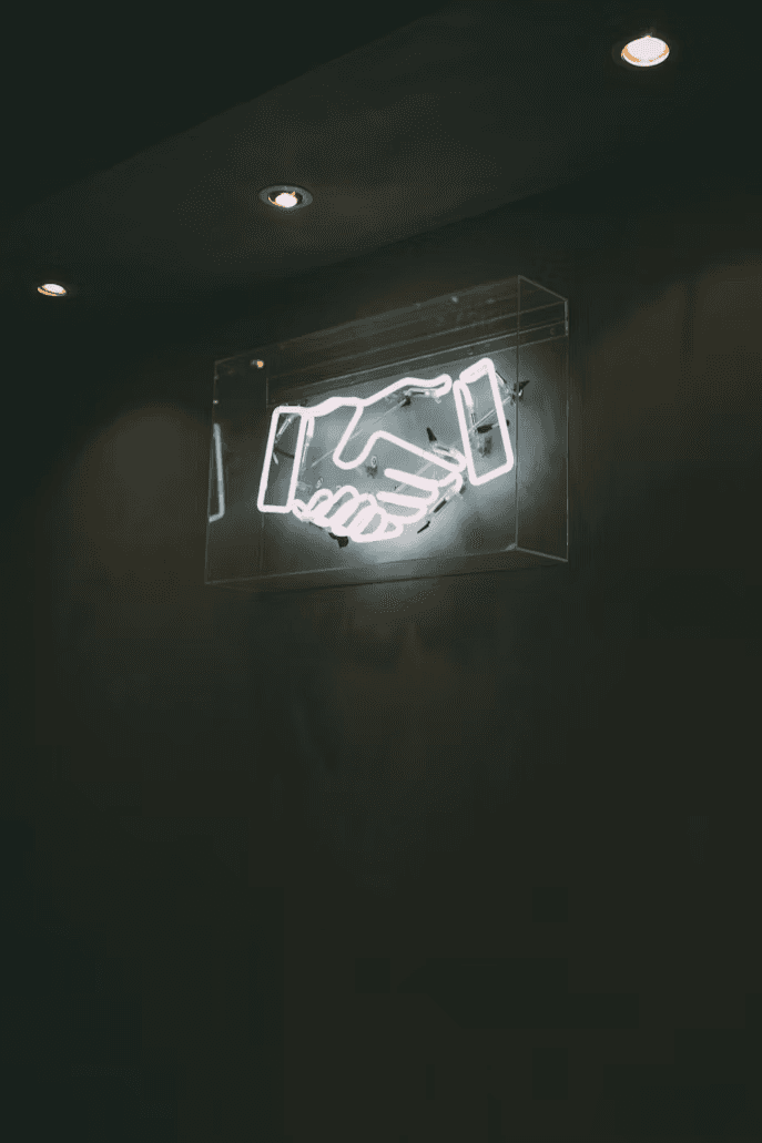 Handshake symbolizing partnership with Technox